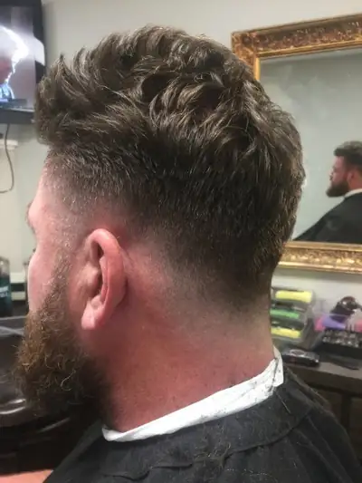 Fade blended into a full beard